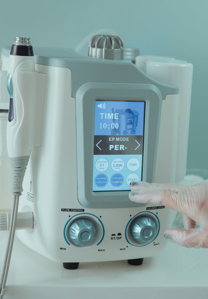 High-tech medical device featuring a digital display and controls in a clinical setting.